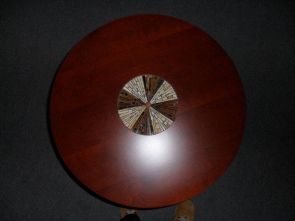 Round Art Deco side table from the 1930s, brown wood with glass mosaic inlay.