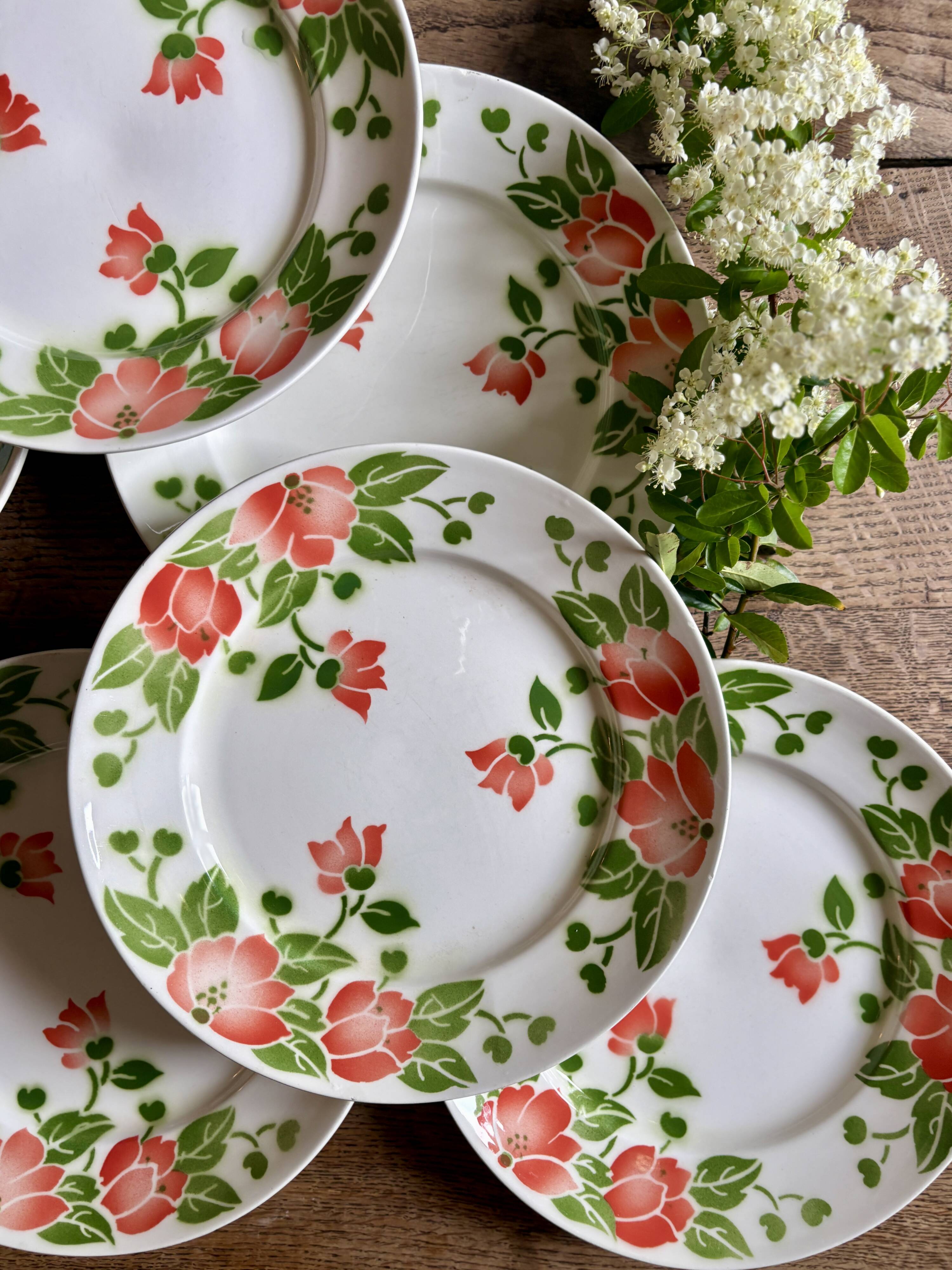 Set of 11 vintage flat plates by Eric de Moulin des Loups.