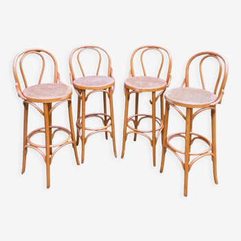 Set of four cane and webbing bar stools