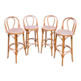 Set of four cane and webbing bar stools