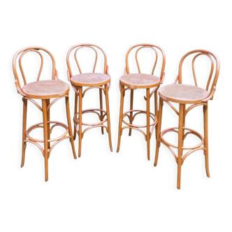 Set of four cane and webbing bar stools