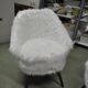 Pair of Mid-Century armchairs in white faux fur with beech legs.
