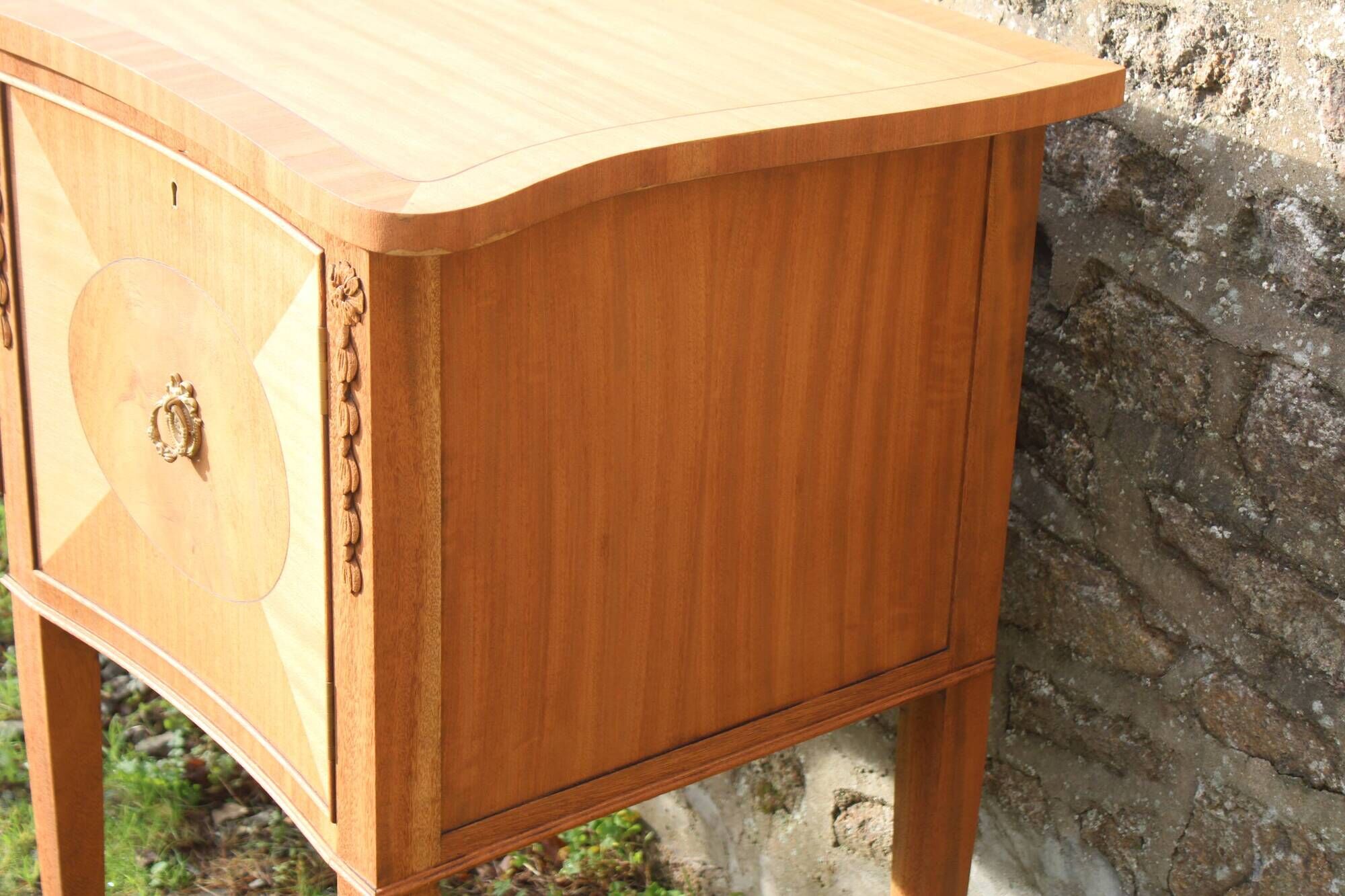 English-made enfilade in Louis XVI style with light wood veneers.
