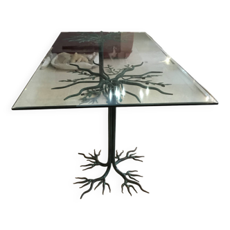 Wrought iron table with tree sculpture and glass top