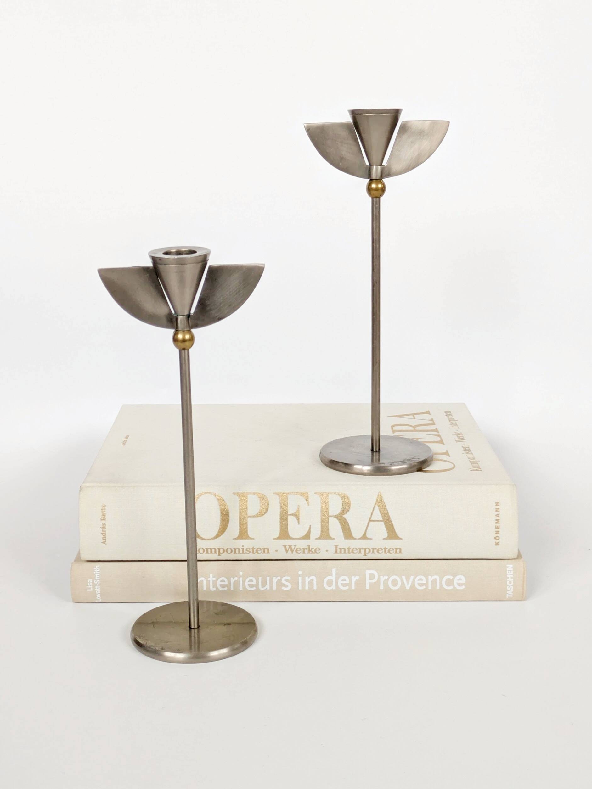 Pair of postmodern 1980s candlesticks, stainless steel and brass