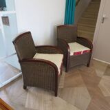 2 armchairs in woven rattan and wood, 1980s