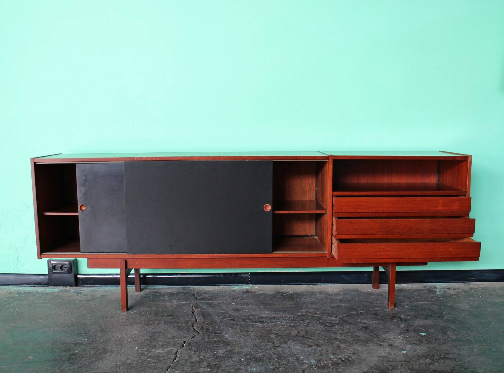 Enfilade or Mid-Century sideboard with sliding doors in black laminate by Saporiti Italia, Italy.