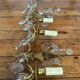 2 vintage bronze wall lights with pendants