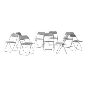Set of 9 chrome folding chairs with fabric from the 1970s.