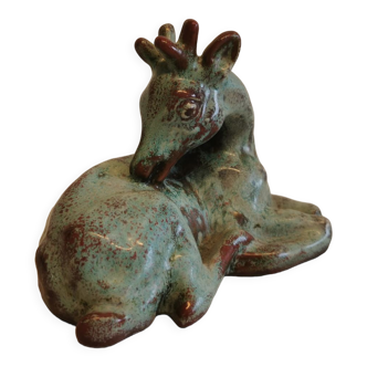 Ceramic sculpture of lying deer, in beautiful mint green shades. Estimated 1960-1970s.