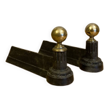 Pair of Napoleon III andirons from the 19th century in cast iron and brass