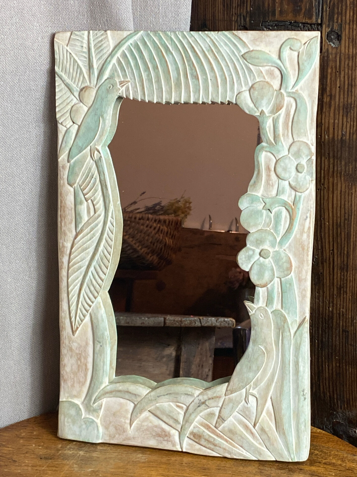 Carved wooden mirror