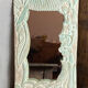 Carved wooden mirror