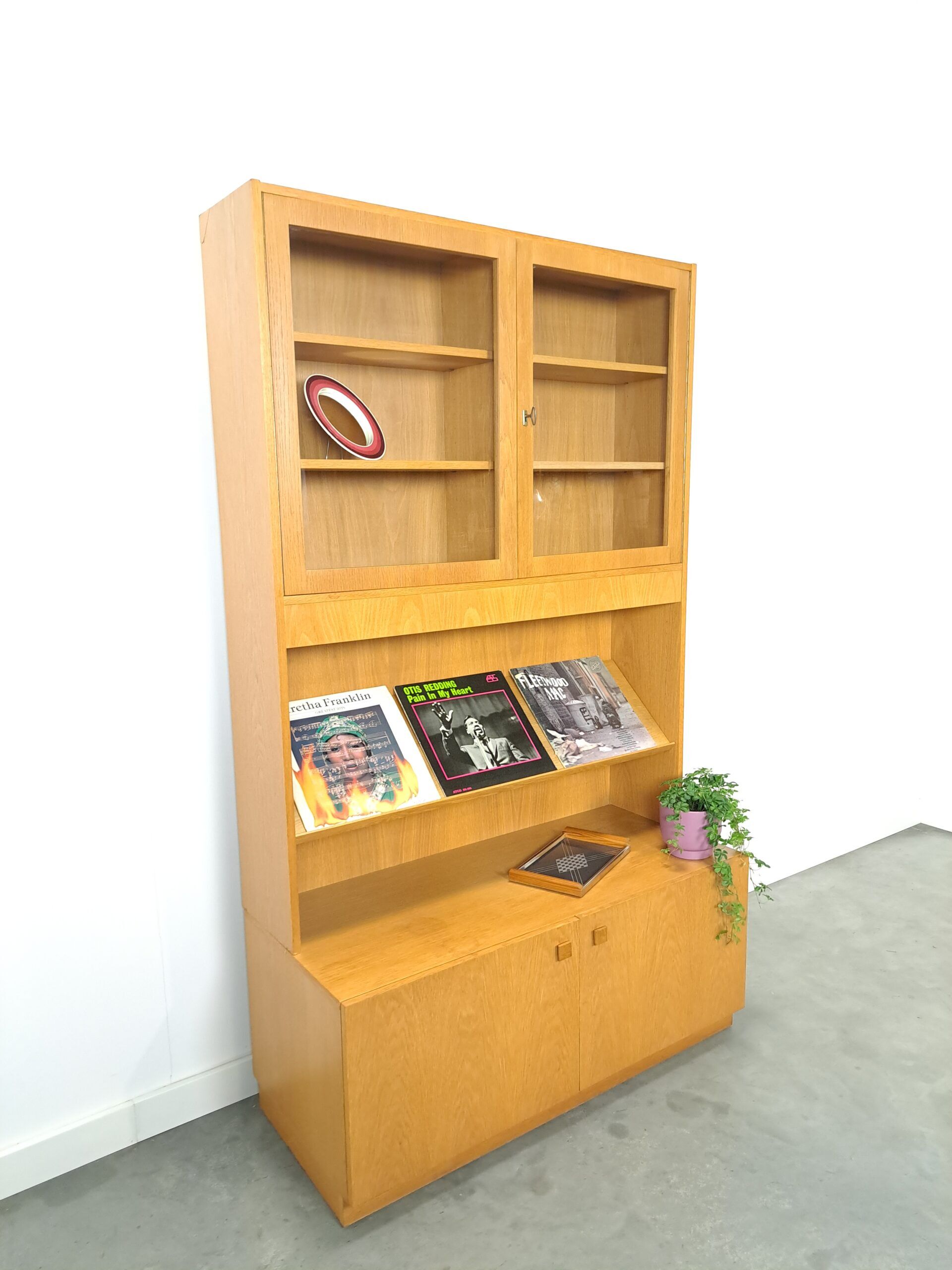 Tall LP display cabinet with glass doors and magazine shelf from Sweden