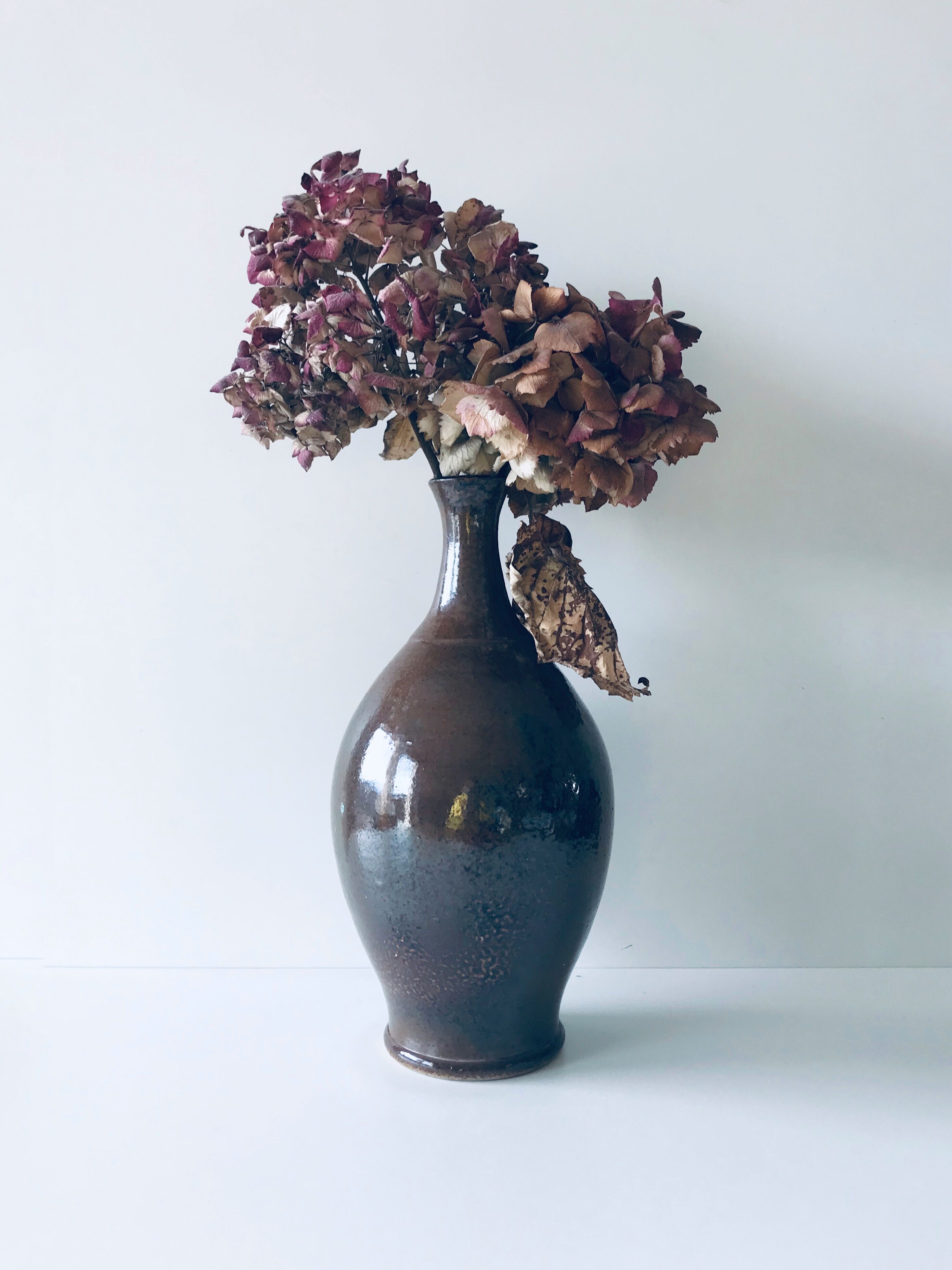 Enamelled sandstone vase