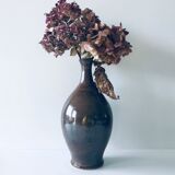 Enamelled sandstone vase