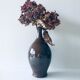 Enamelled sandstone vase