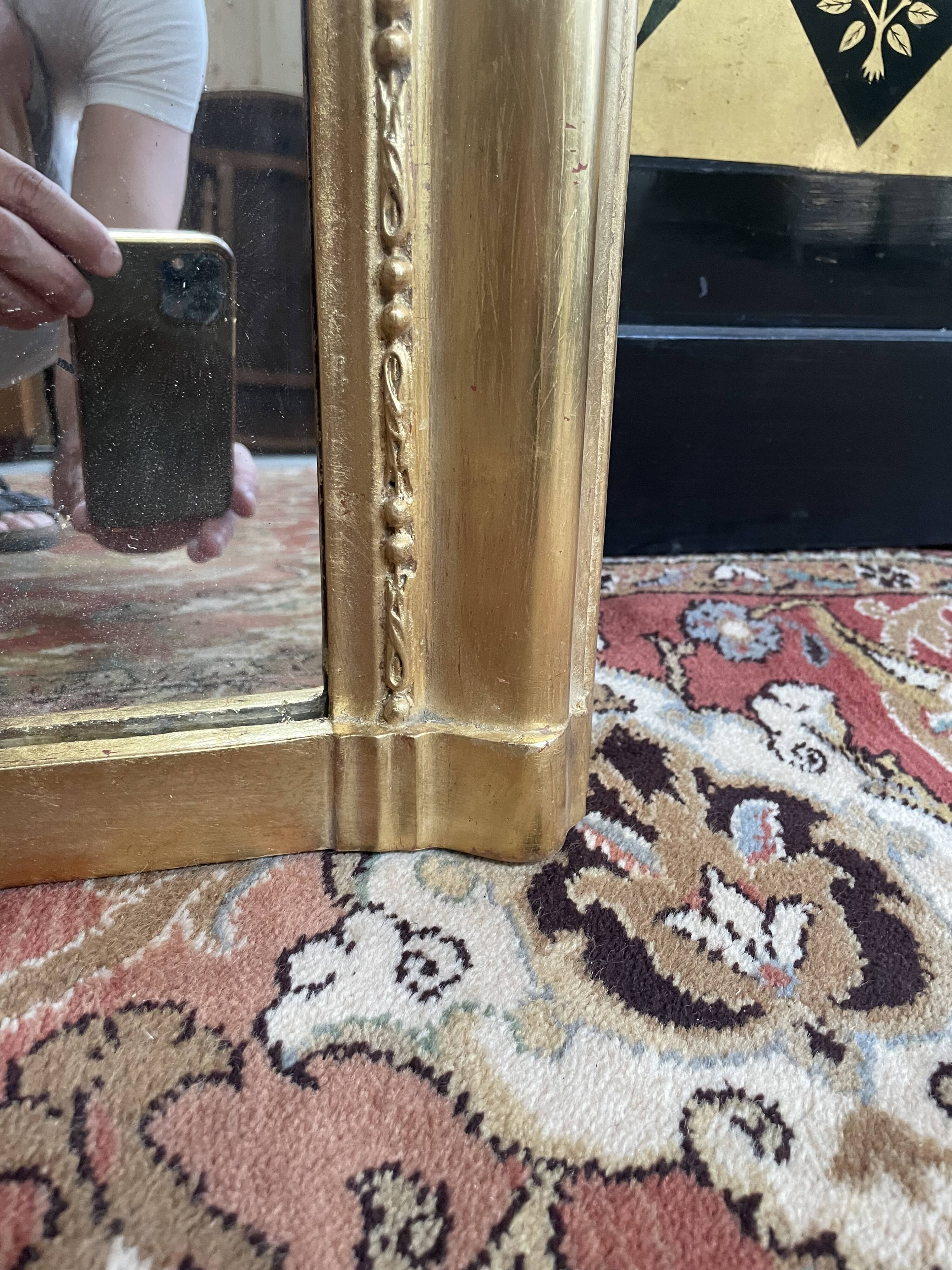 Louis Philippe era mirror with restored gold leaf