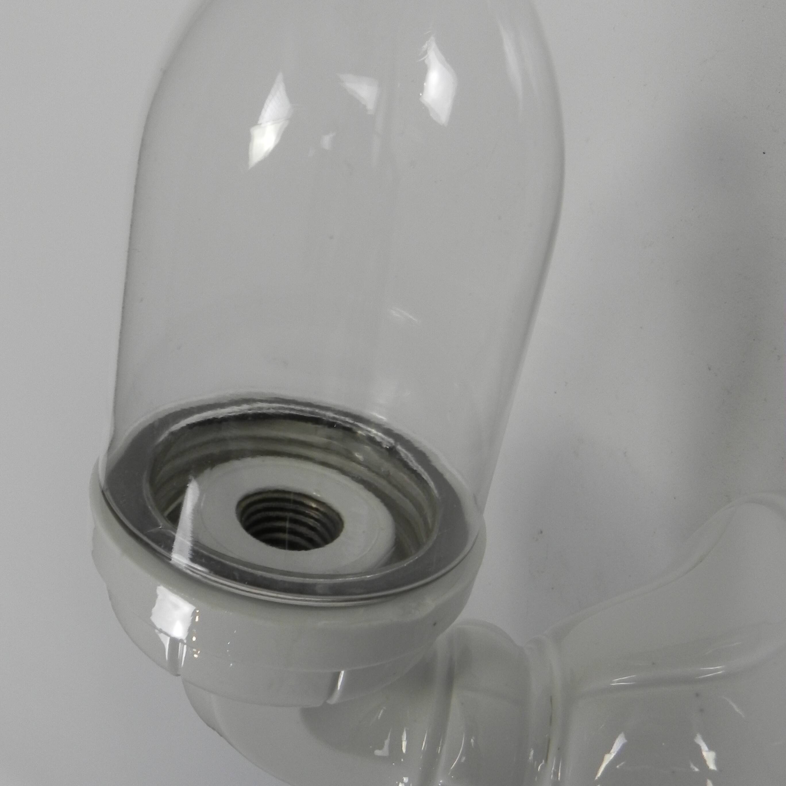 Wall lamp in porcelain with a transparent glass shade, 1930s.