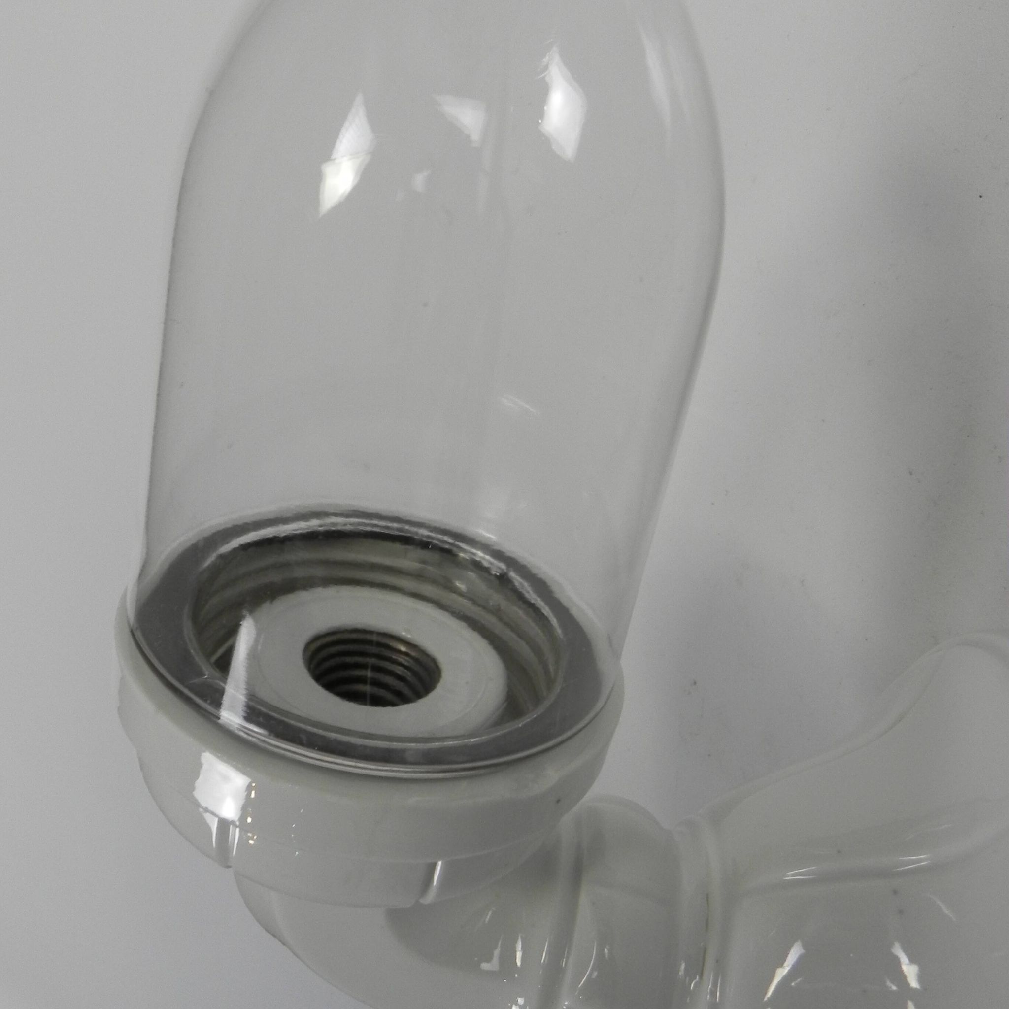 Wall lamp in porcelain with a transparent glass shade, 1930s.