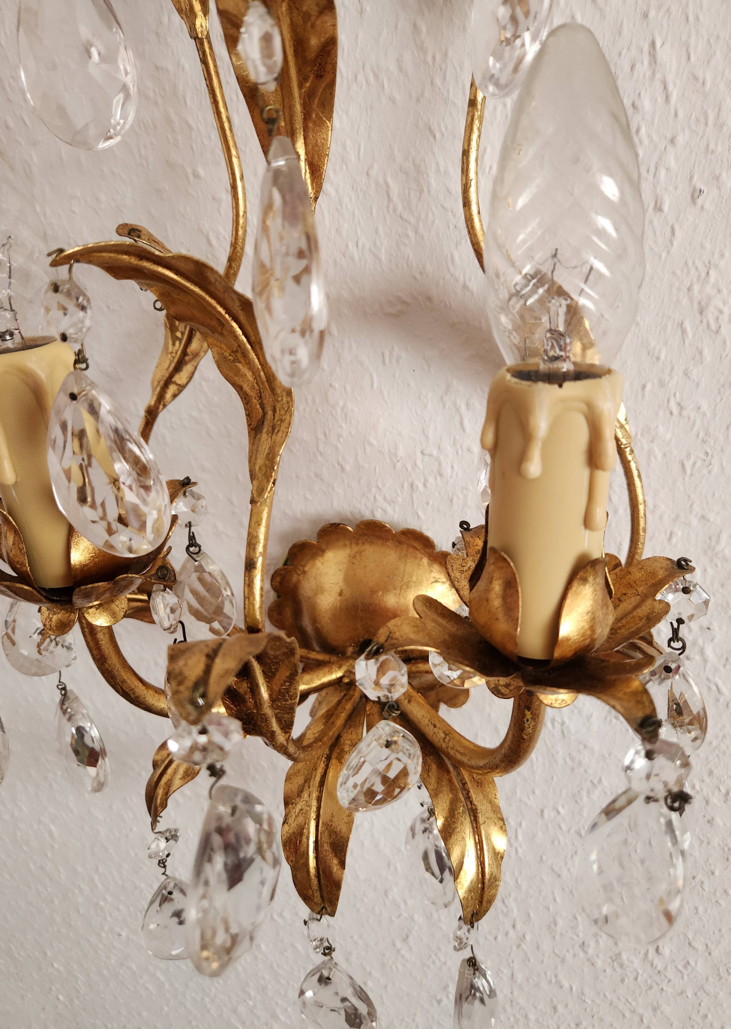 Hand-forged wall lamp gilded with gold leaf and crystals, Italy