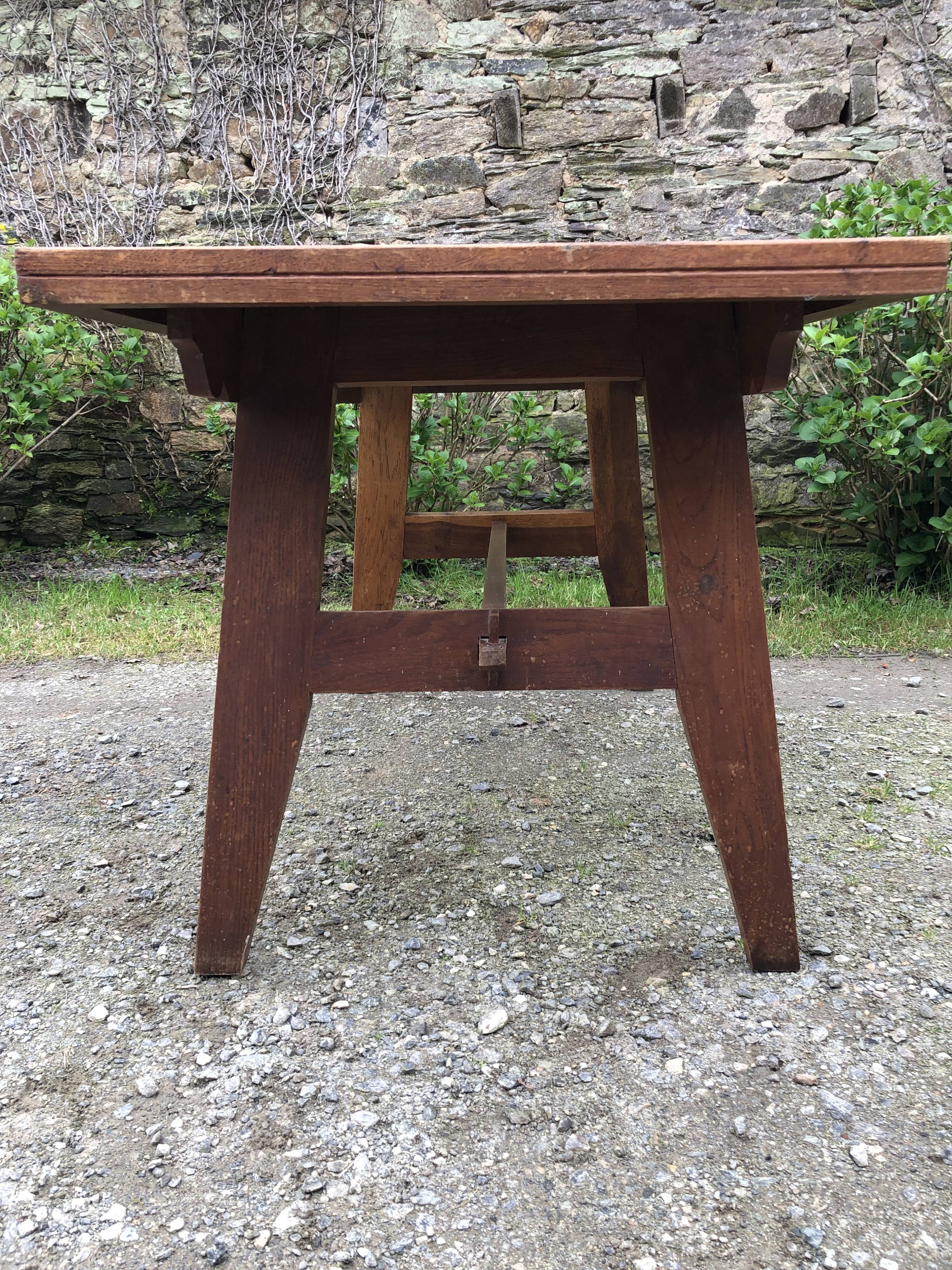 Vintage René Gabriel oak table from the reconstruction period.