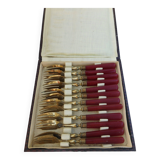 Twelve bakelite handle cake forks