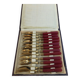 Twelve bakelite handle cake forks