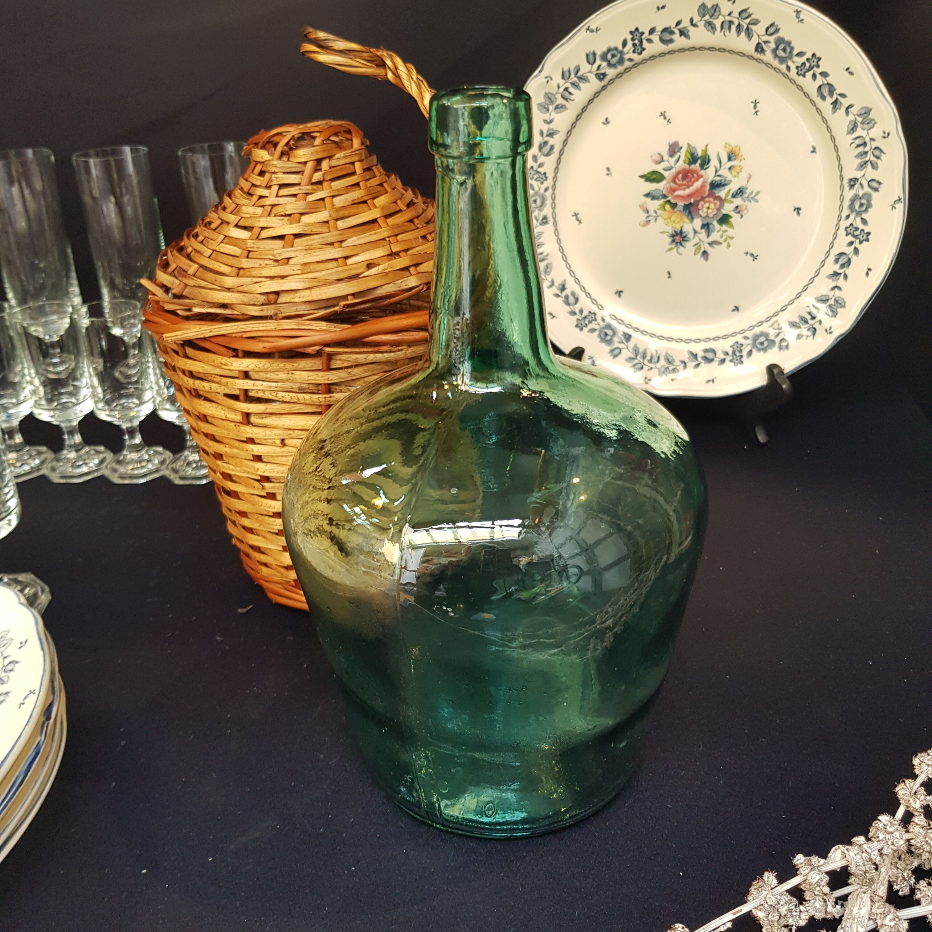 glass and rattan bottle