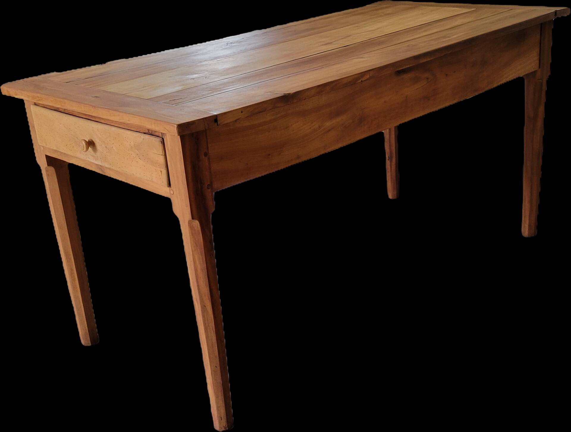 Old farmhouse table made of solid walnut wood.