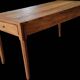 Old farmhouse table made of solid walnut wood.