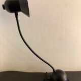 Articulated and adjustable black metal lamp