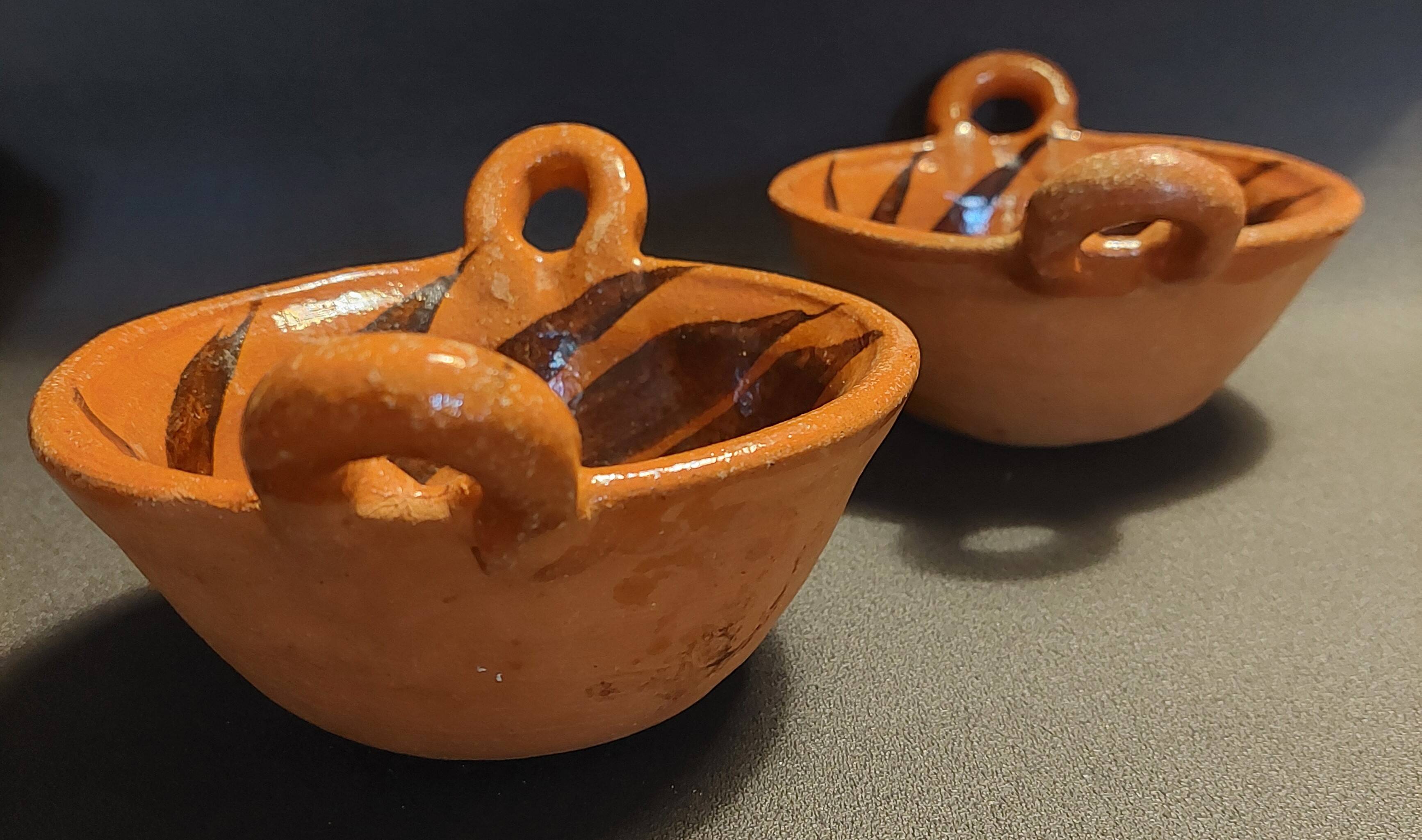 Pair of handled bowls, glazed terracotta, Mexico, mid-20th century.