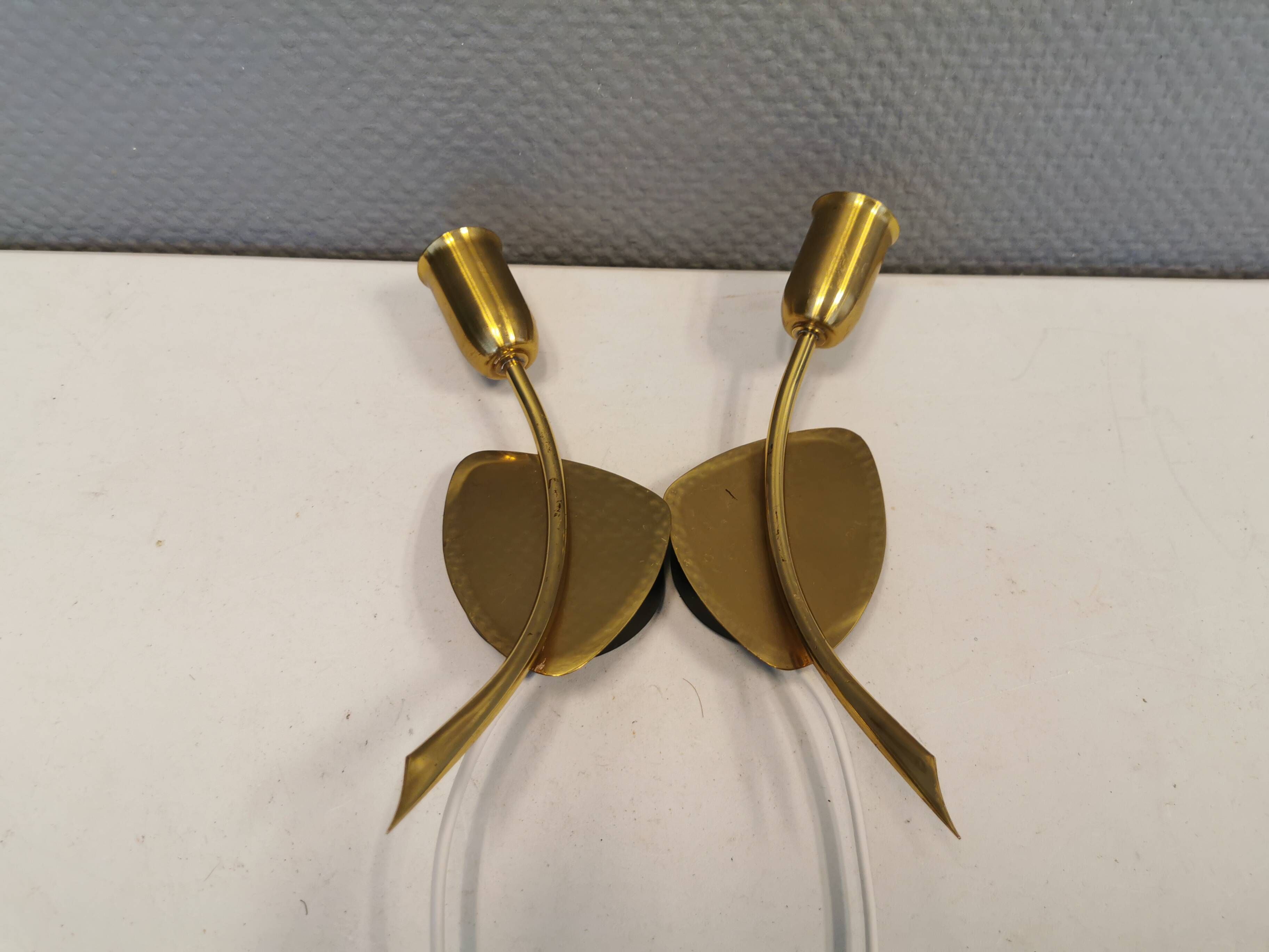 A set of "tulip" wall lamps in golden colored metal. Danish 1970-80s