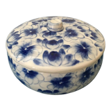 Porcelain candy dish. Blue flower patterns on white background