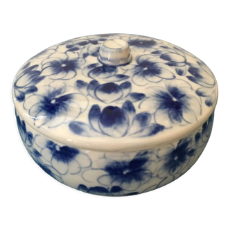 Porcelain candy dish. Blue flower patterns on white background