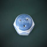Porcelain salt shaker with blue patterns
