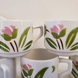 5 cups and ceramic saucers