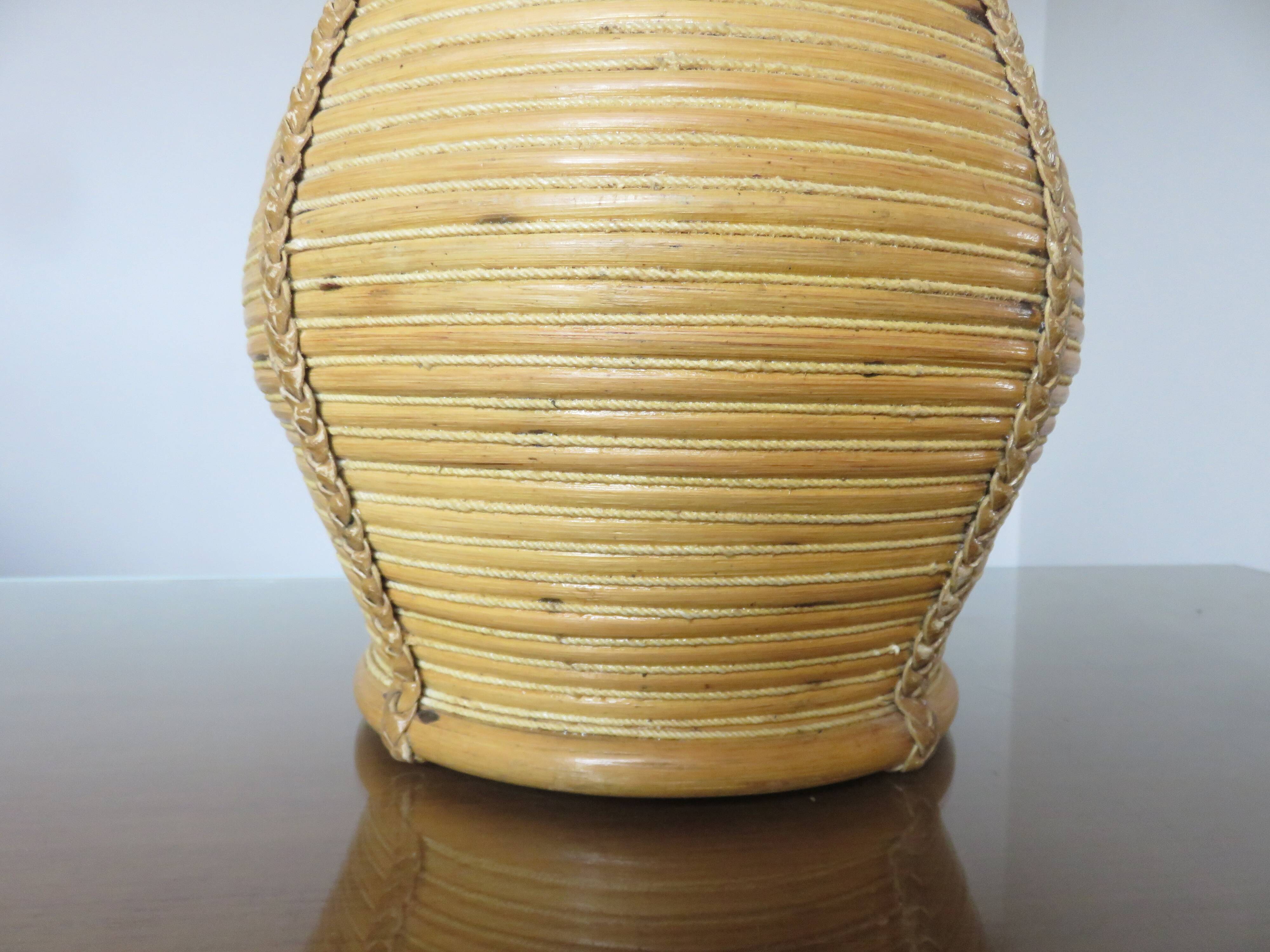 Rattan, leather, rope, and wood lamp in the style of Gabriella Crespi 60-70.