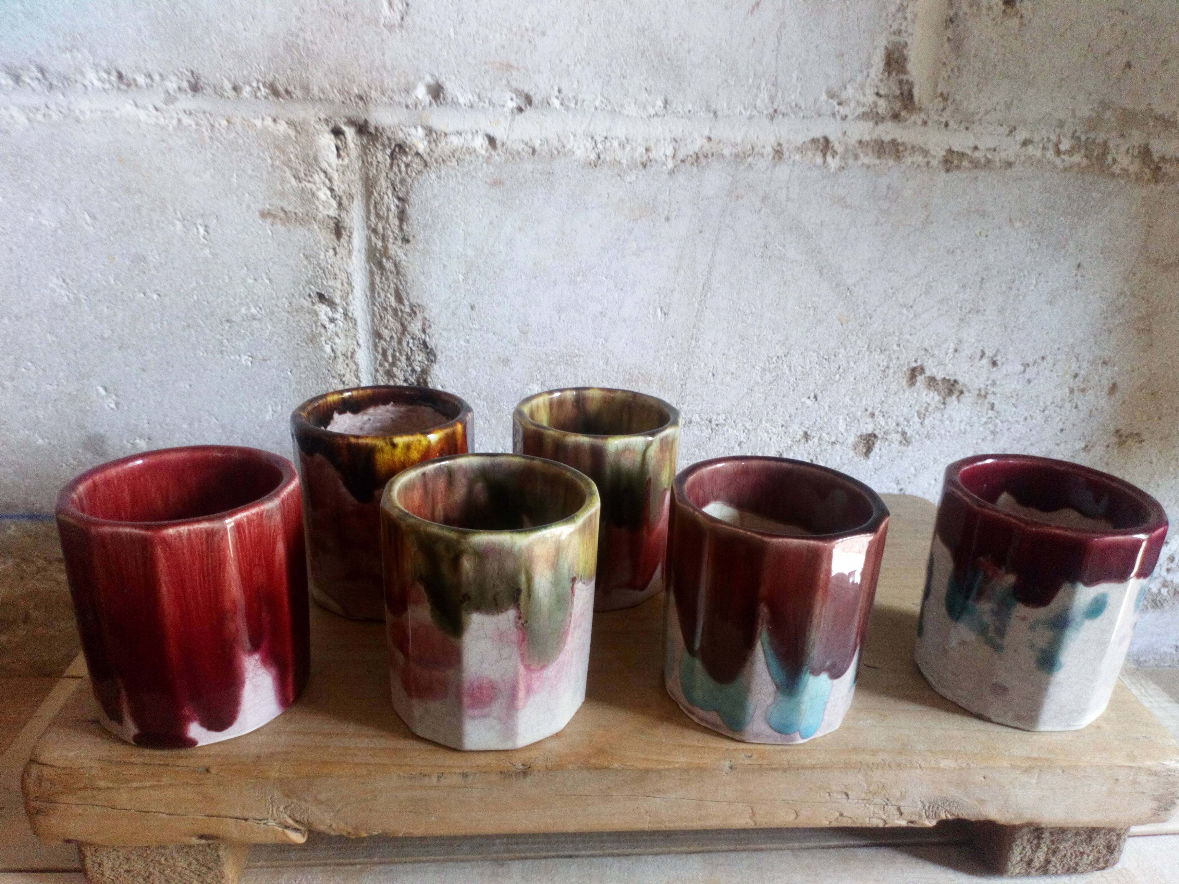 Six old yoghurt pots in enamelled porcelain