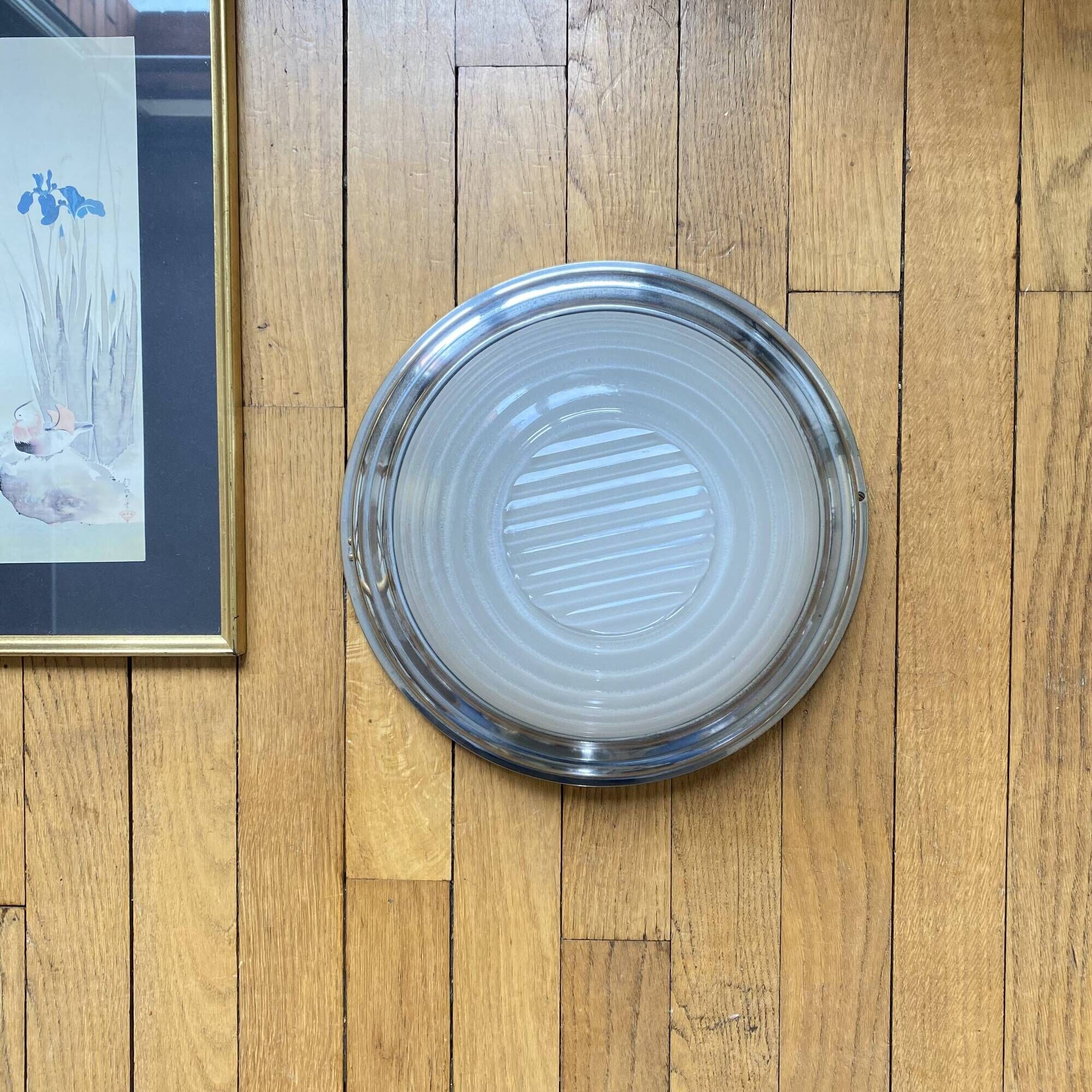 Thick glass ceiling light fixture with a chrome metal support, Holophane type.