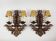 Pair of wrought iron sconces "Venetian masks"