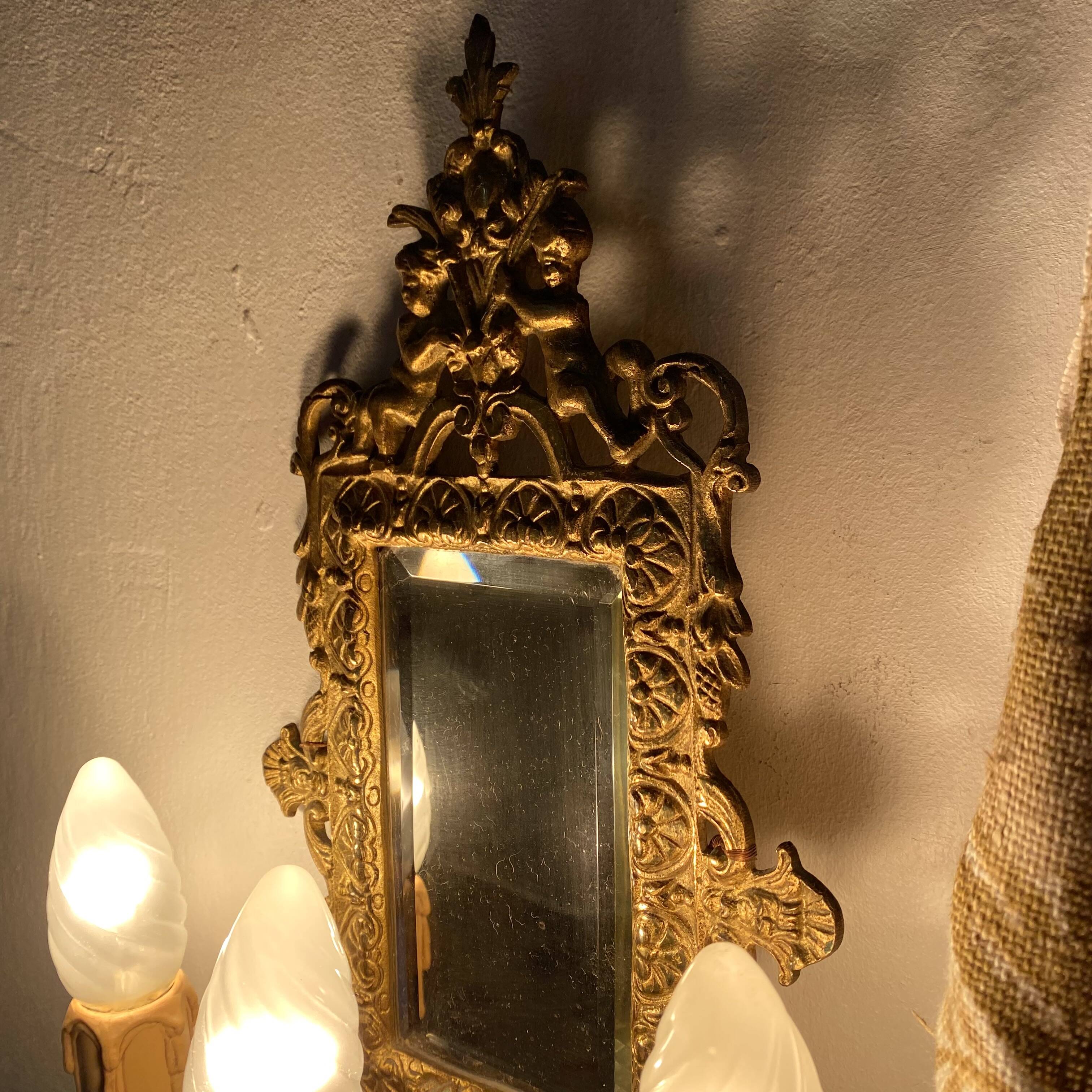 19th-century Napoleon III style gilded bronze wall sconce with bevelled mirror.