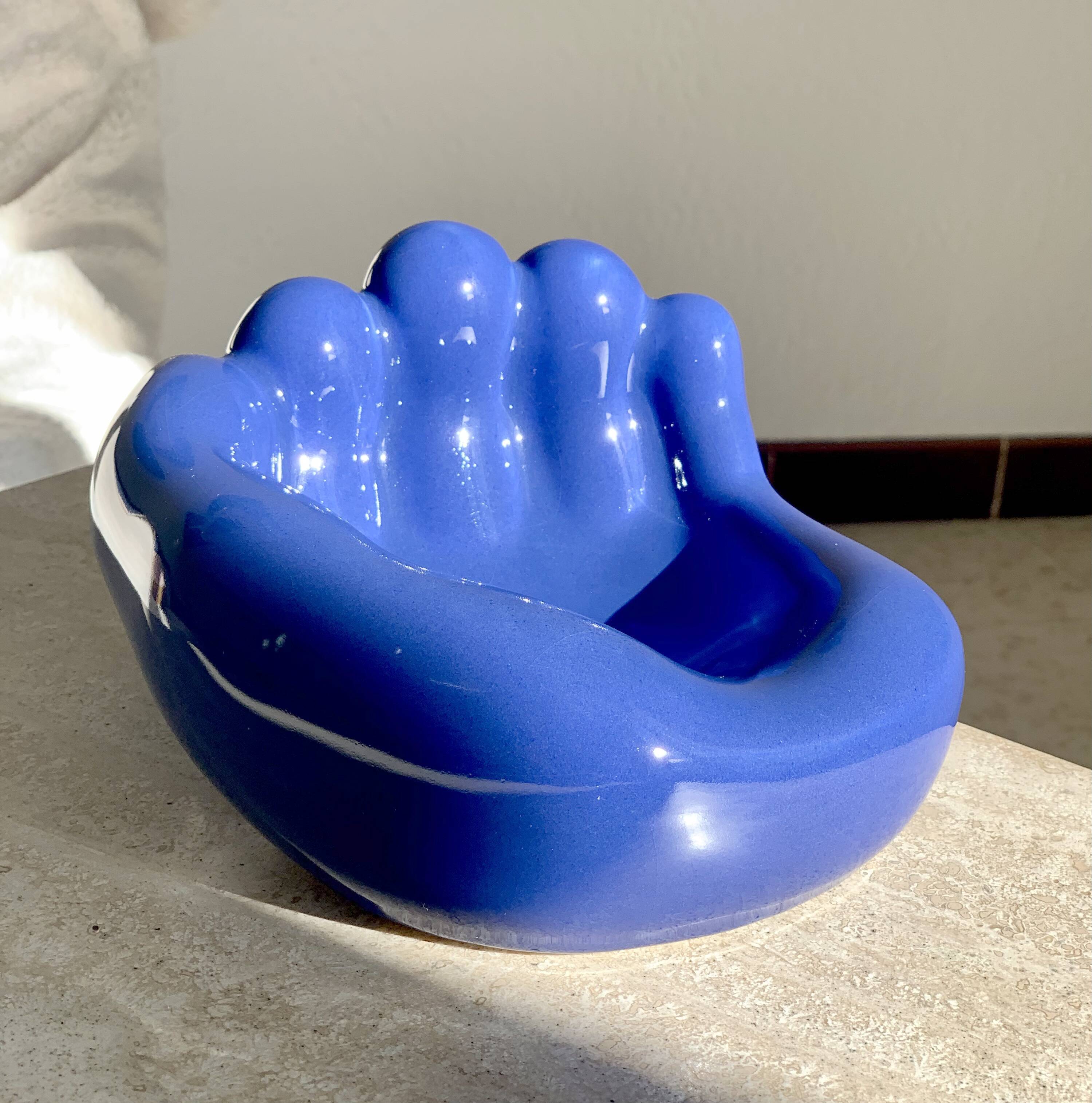 Empty vintage hand-shaped pocket