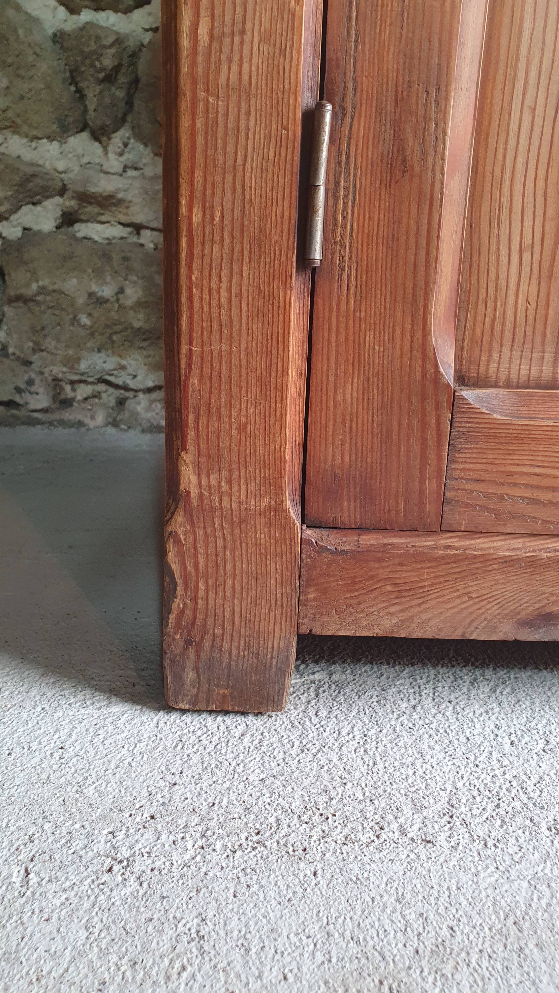 Small cabinet made of raw wood