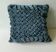 Pair of old cushions, in duck blue velvet, pleated effect