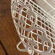 Corner shelf in openwork metal