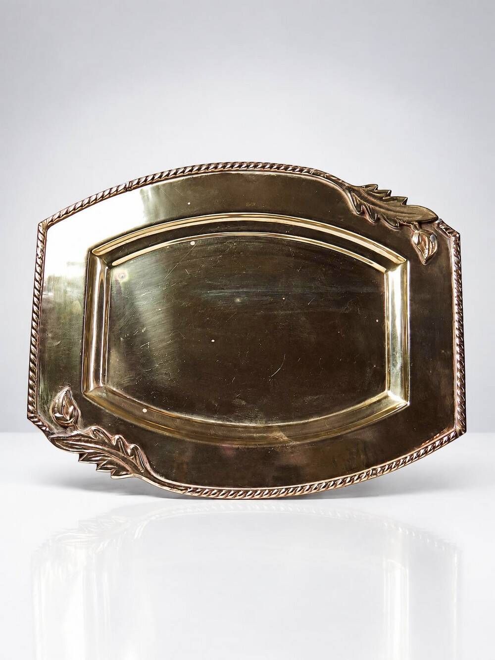 Small vintage brass tray with a floral design, Louis XVI style.