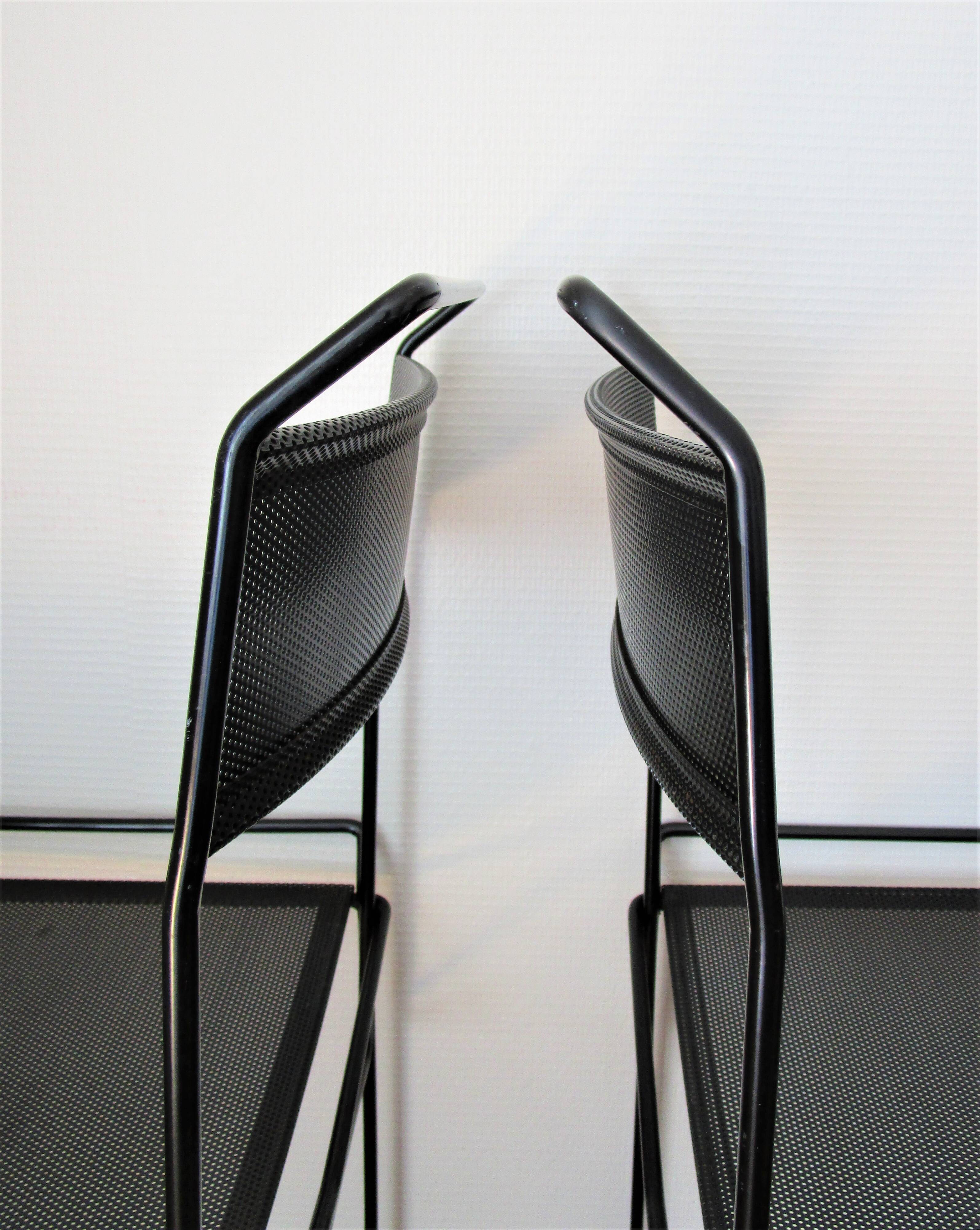 Pair of perforated metal steel chairs from the 80s