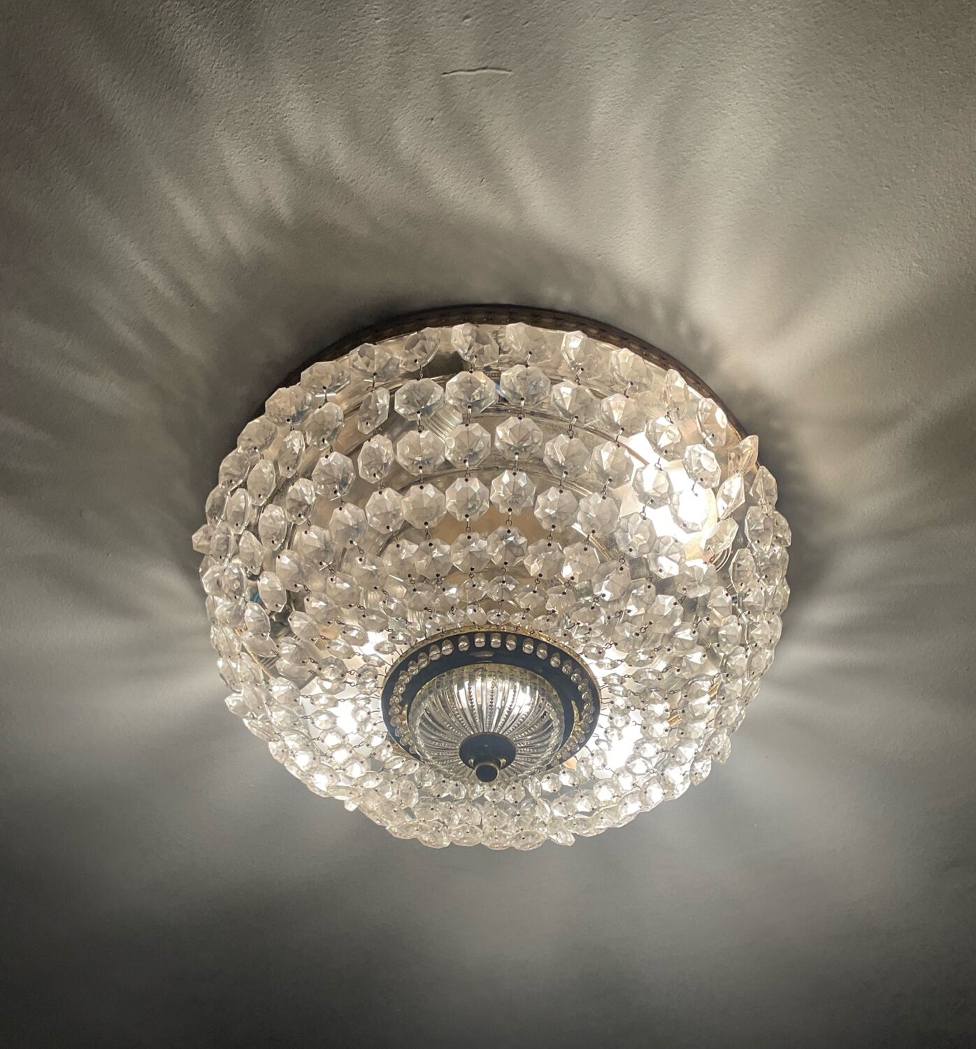Vintage ceiling light with pendants and brass.